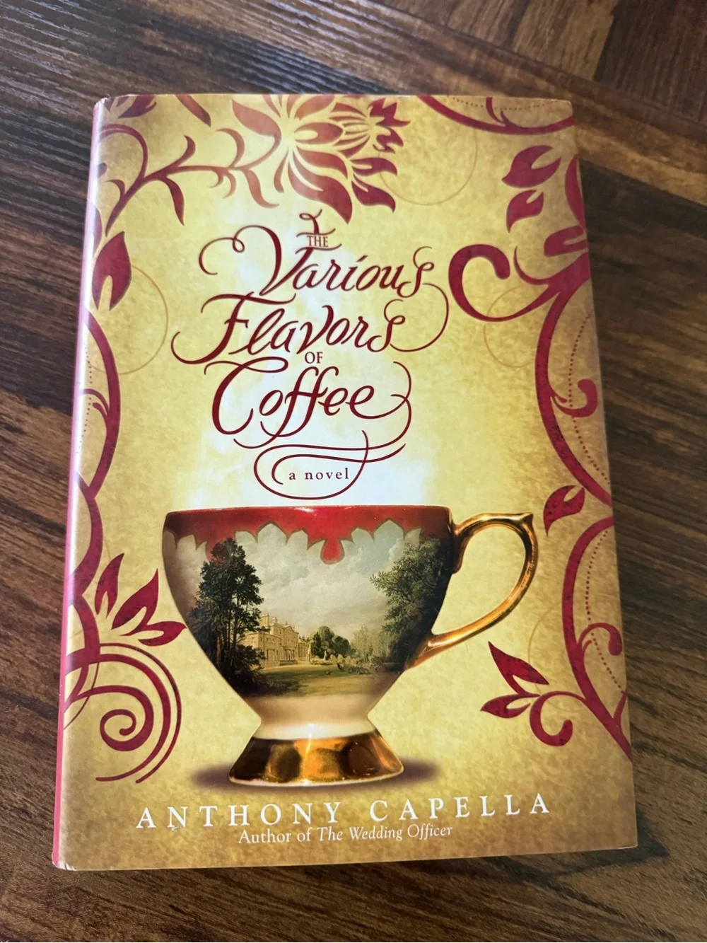 The Various Flavors of Coffee by Anthony Capella - Gold & Burgundy Hardcover